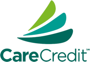 CareCredit logo featuring three layered, green and teal leaves above the text "CareCredit.