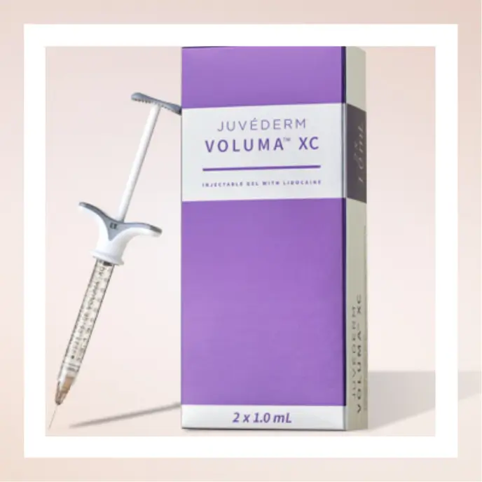 A box of Juvéderm Voluma XC with an accompanying syringe displayed against a neutral background.