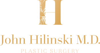 Logo featuring a large letter "H" above the name "John Hilinski M.D." with the text "Plastic Surgery" below. The color scheme is gold and black.